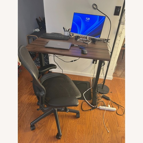 Used UPLIFT V2 Standing Desk Adjustable Height + Mat for sale on AptDeco