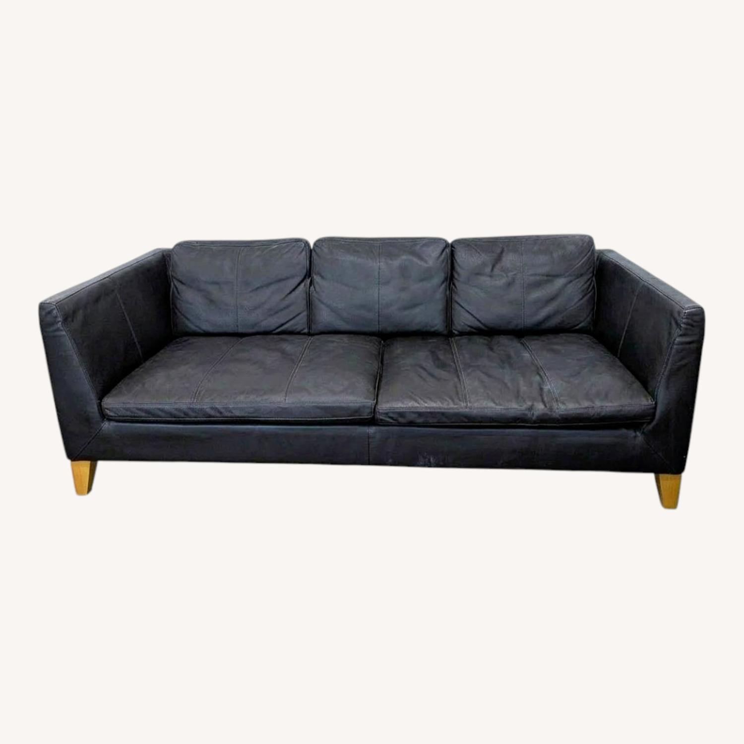 IKEA 3-Seat Dark Leather Sofa with Wooden Legs - image-0