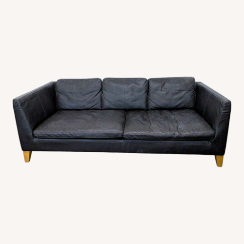 Used IKEA 3-Seat Dark Leather Sofa with Wooden Legs for sale on AptDeco