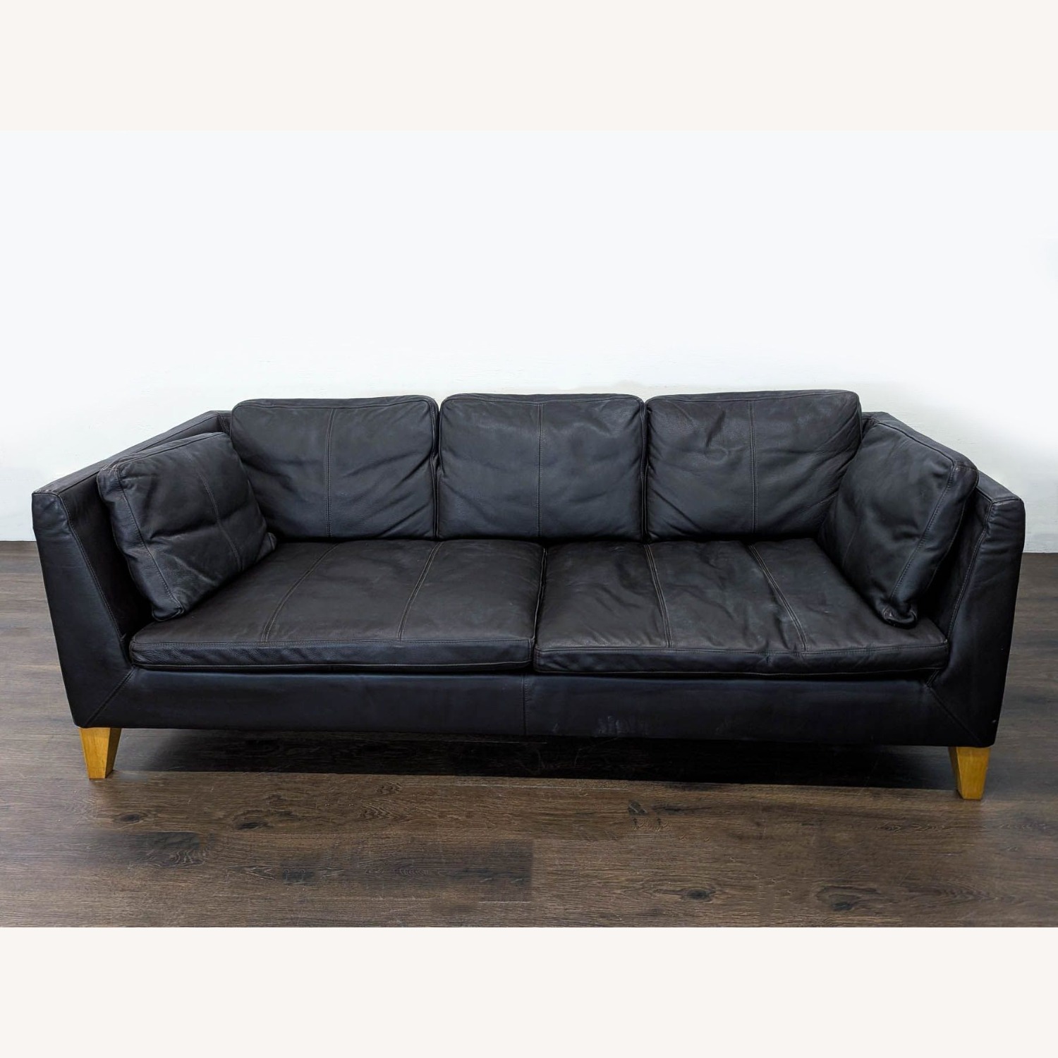 IKEA 3-Seat Dark Leather Sofa with Wooden Legs - image-3