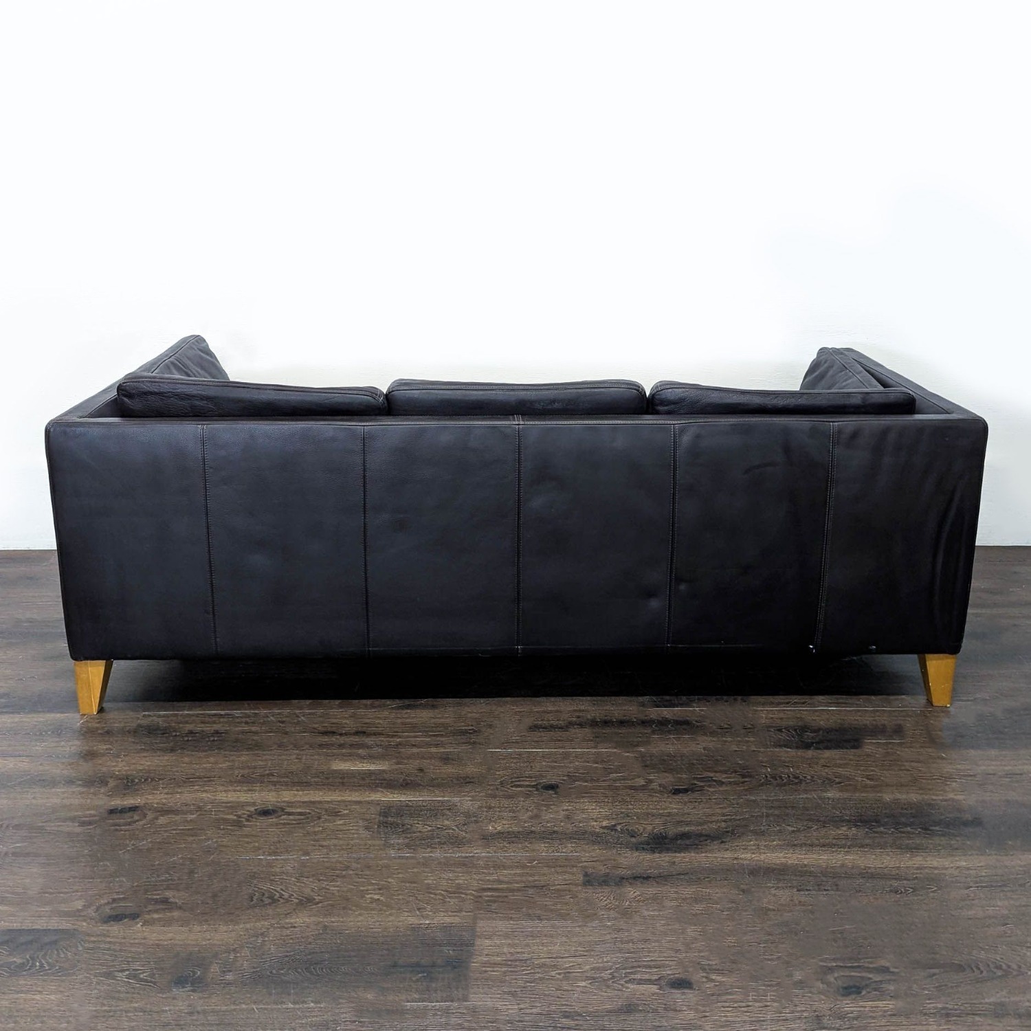 IKEA 3-Seat Dark Leather Sofa with Wooden Legs - image-2