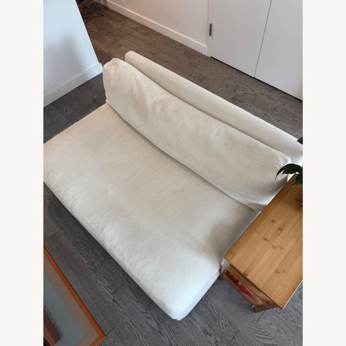 Used CB2 Natural Linen Loveseat for sale on AptDeco