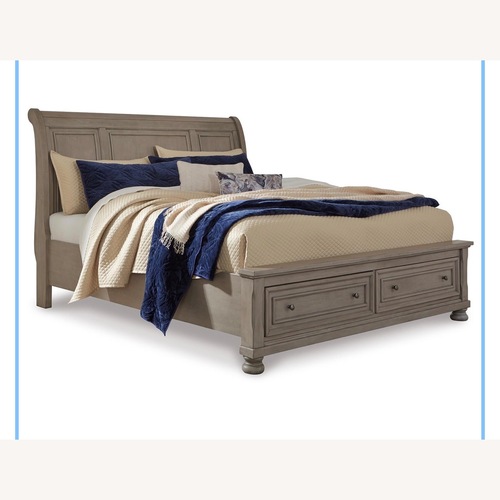 Used Ashley Furniture Light Gray Wood King Bed for sale on AptDeco