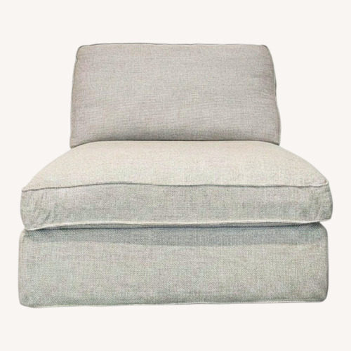 Used Modern Armless Lounge Chair with Plush Cushions	 for sale on AptDeco