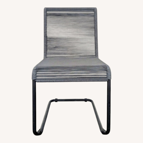 Used Modern Black Woven Outdoor Chair for sale on AptDeco