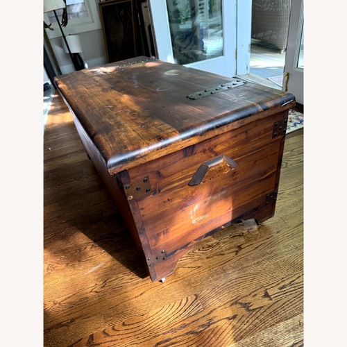 Used Vintage/Antique Dark Brown Wood Chest for sale on AptDeco