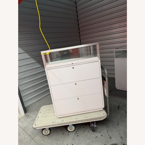 Used White Glass Nightstand for sale on AptDeco