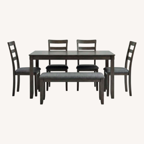 Used Ashley Signature Design Gray Wood 6 Person Dining Table Chairs and Bench for sale on AptDeco