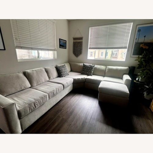 Used Living Spaces Alder Light Gray 3+ Piece Sectional for sale on AptDeco