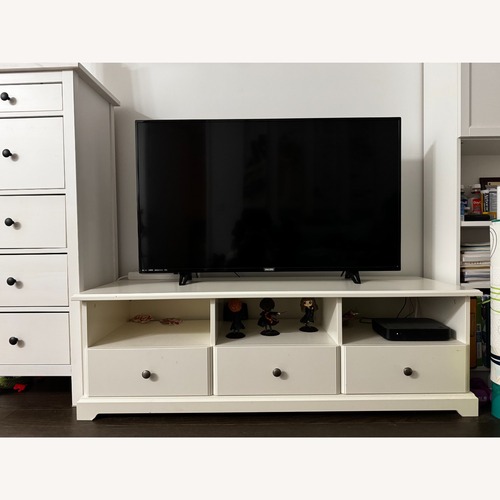 Used IKEA White Wood TV Stand with Drawers  for sale on AptDeco