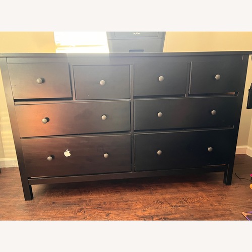 Used Raymour & Flanigan Black Wood Dresser for sale on AptDeco