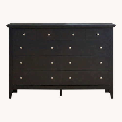 Used Raymour & Flanigan Black Wood Dresser for sale on AptDeco