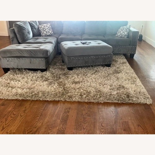 Used Gray Suede Sectional Couch W/ Ottoman for sale on AptDeco