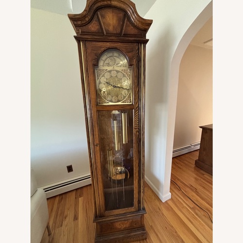 Used Howard Miller Model 610-202 Geandfather Clock for sale on AptDeco