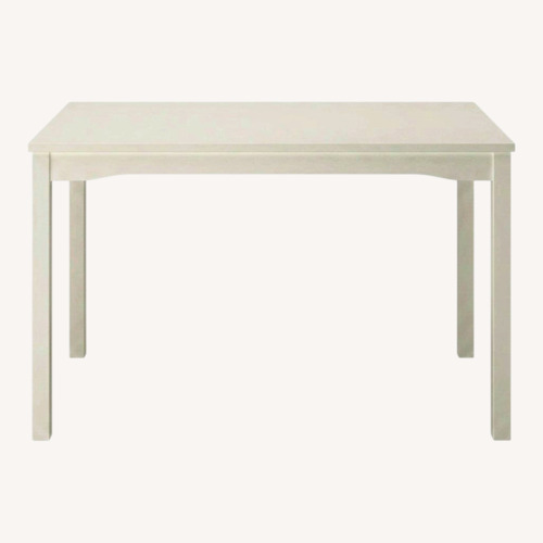 Used IKEA Hauga White Wood Dining Table for sale on AptDeco