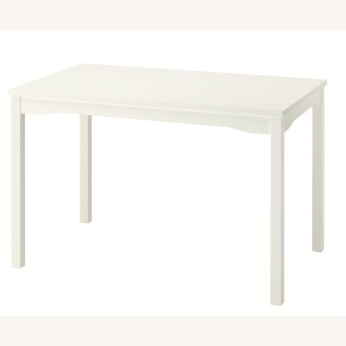 Used IKEA Hauga White Wood Dining Table for sale on AptDeco