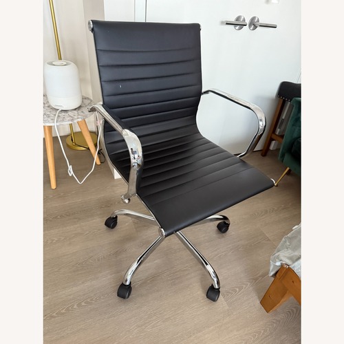 Used Modern Black Leather Office Chair for sale on AptDeco