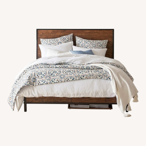 Used Pottery Barn Juno Dark Brown Wood King Bed for sale on AptDeco