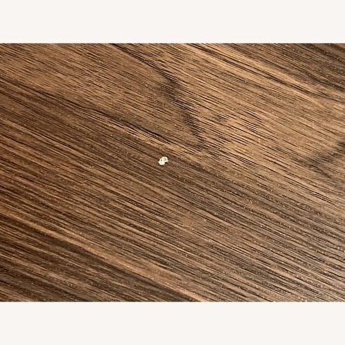 Used Amazon Dark Brown Dining Table for sale on AptDeco