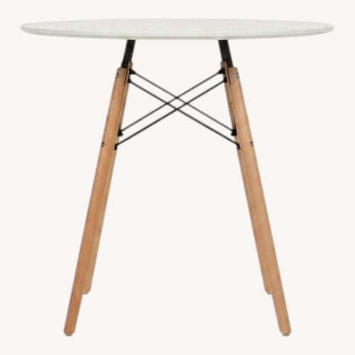 Used Herman Miller Flynn White Wood Dining Table for sale on AptDeco