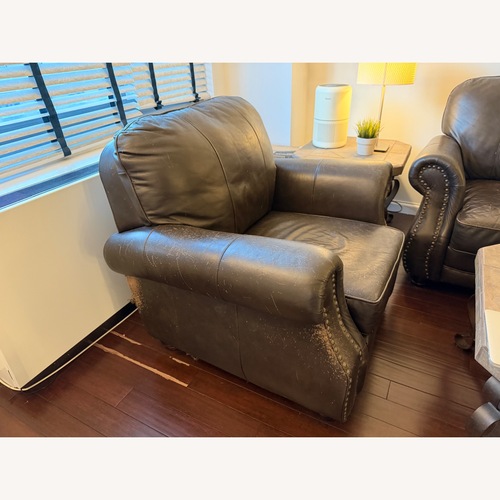 Used Dark Brown Leather Chair for sale on AptDeco