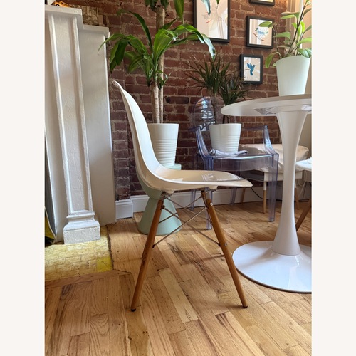 Used Herman Miller White Wood Dining Chair for sale on AptDeco