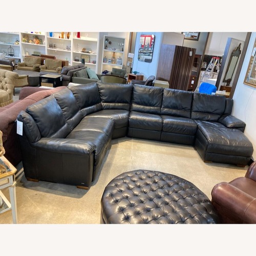 Used Contemporary Curved Leather Sectional for sale on AptDeco