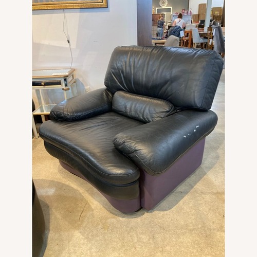Used Postmodern Leather Swivel Armchair for sale on AptDeco