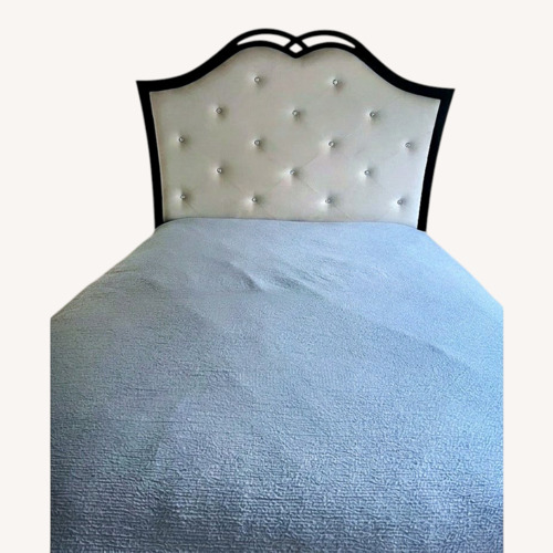 Used Raymour & Flanigan Dark Brown Wood Queen Bed for sale on AptDeco