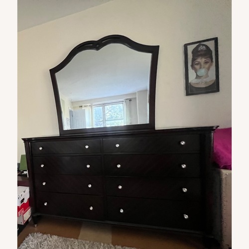 Used Raymour & Flanigan Dark Brown Wood Dresser for sale on AptDeco
