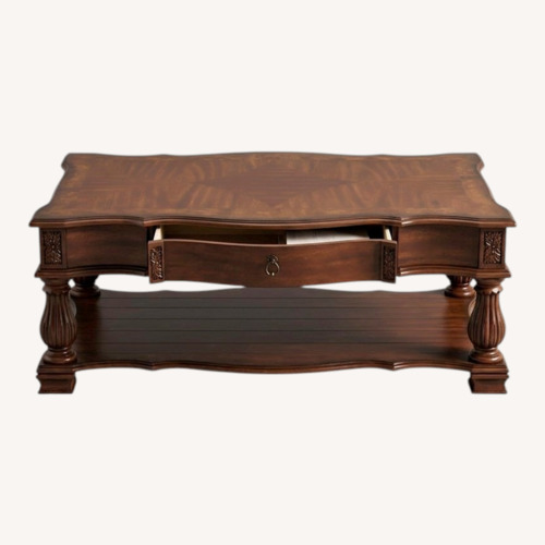 Used Solid Wood Coffee Table with Drawers for sale on AptDeco