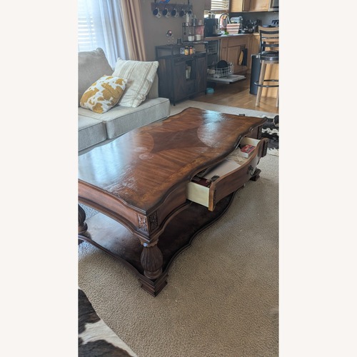 Used Solid Wood Coffee Table with Drawers for sale on AptDeco