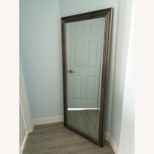 Used Contemporary Champagne Silver Leaner Floor Mirror for sale on AptDeco