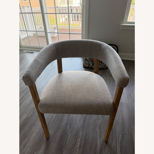 Used 4 Barbuda Upholstered Dining Armchairs for sale on AptDeco