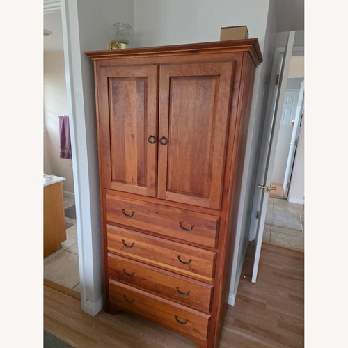 Used Dark Brown Armoire for sale on AptDeco