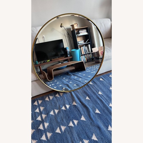Used Pottery Barn Stowe Brass Wall Mirror for sale on AptDeco