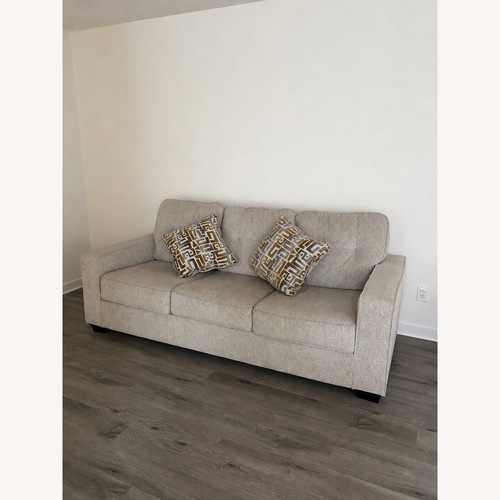 Used Ashley Furniture Dark Brown Sleeper Sofa for sale on AptDeco