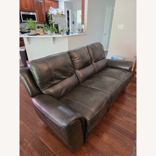 Used Rooms To Go Dark Gray Dual Motor Powered Reclinging Couch for sale on AptDeco