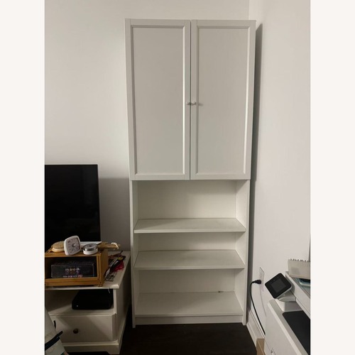 Used IKEA White Bookcase with Cabinet Storage for sale on AptDeco