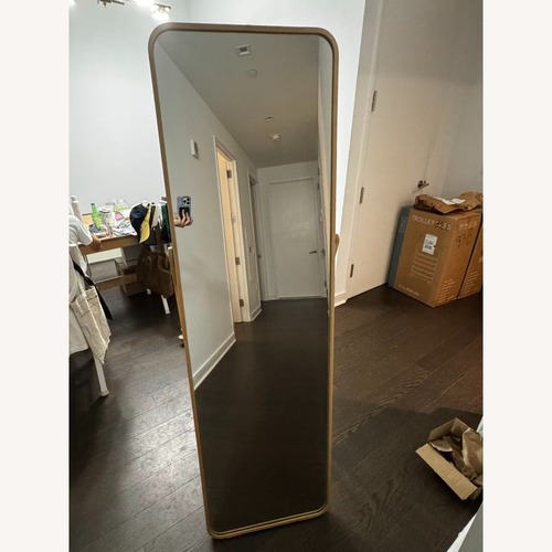 Used IKEA Floor Mirror with Built-In Clothing Rack for sale on AptDeco