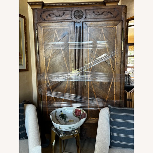 Used Hardwood Classic French Style Armoire for sale on AptDeco