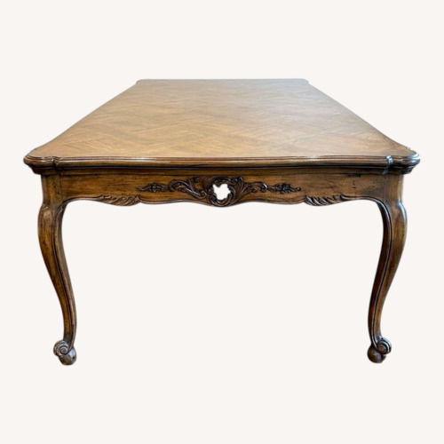 Used Antique Dark Brown Wood Dining Table for sale on AptDeco