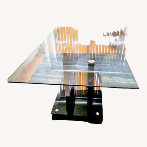 Used Black Glass Dining Table for sale on AptDeco