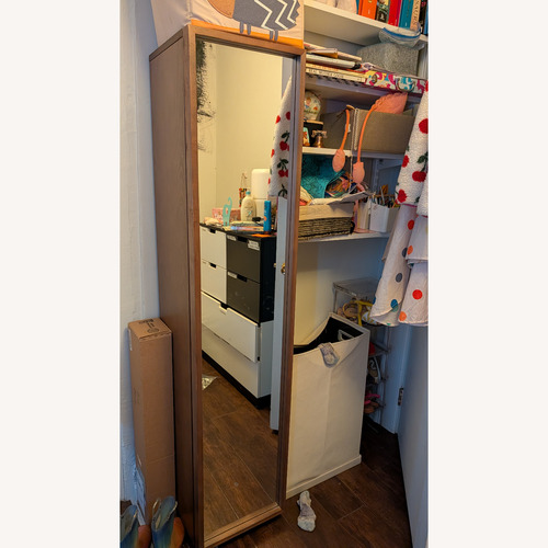 Used CB2 Reflection Dark Brown Wood Armoire for sale on AptDeco