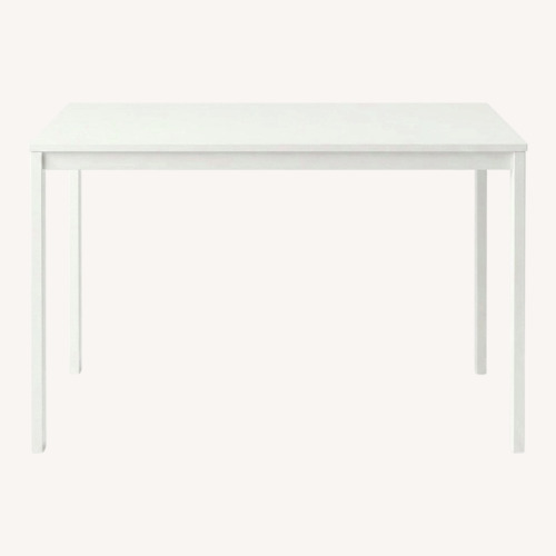 Used IKEA Vihals White Wood Dining Table for sale on AptDeco