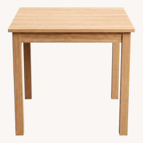 Used Bob's Discount Furniture Light Brown Dining Table for sale on AptDeco