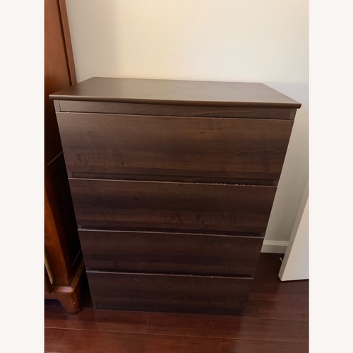 Used Dark Brown Wood Dresser for sale on AptDeco