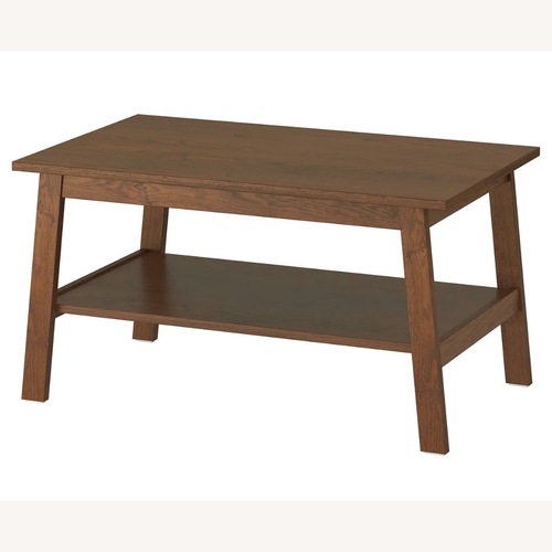 Used IKEA LUNNARP Brown Wood Stain Coffee Table for sale on AptDeco