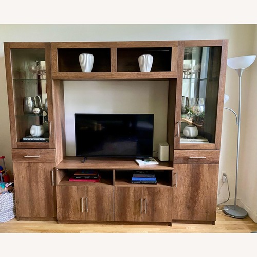 Used Custom Dark Brown Wood Media Storage for sale on AptDeco