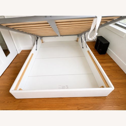 Used IKEA MALM Queen Lift Storage Bed/Headboard for sale on AptDeco